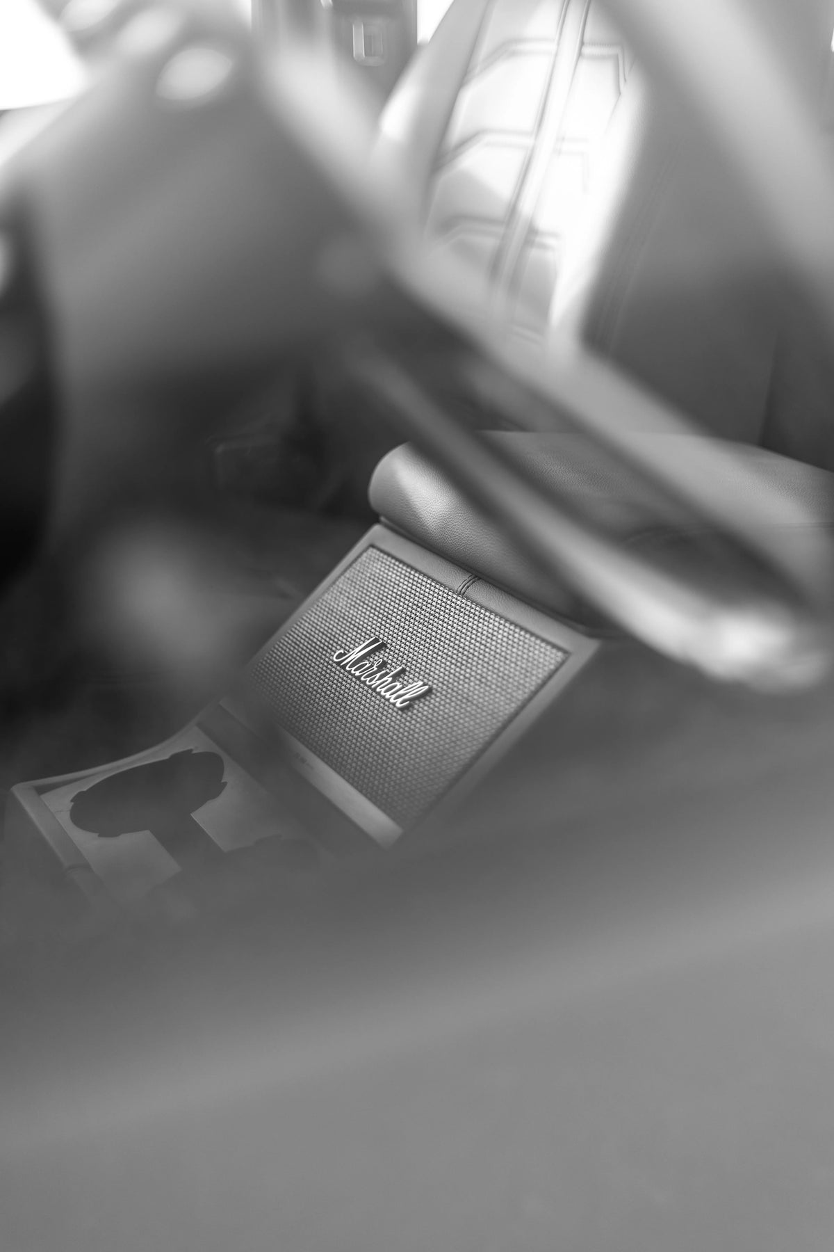 Black-and-white detail of a Leica camera case inside the Miami Blue Defender 110