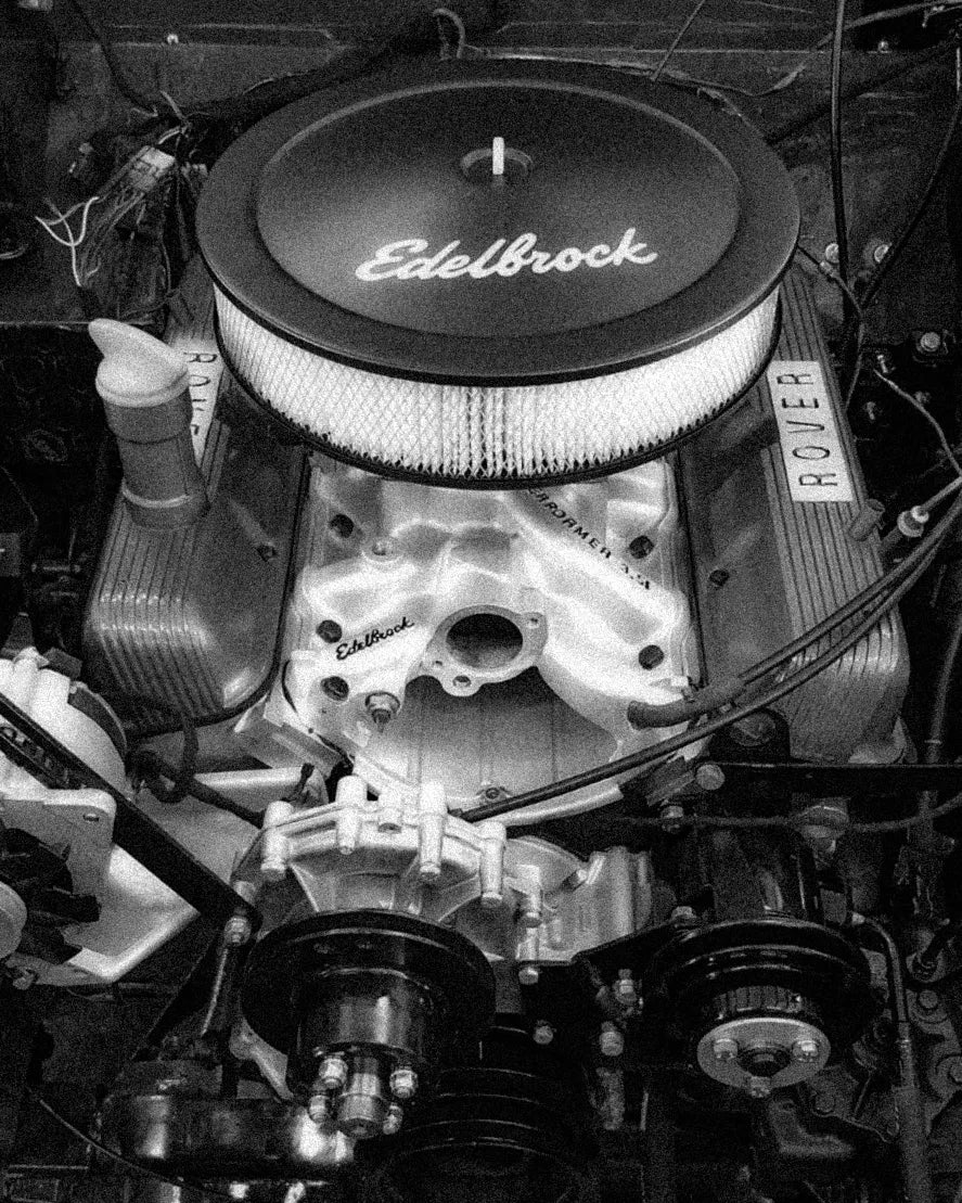 Black-and-white close-up of a Rover V8 engine